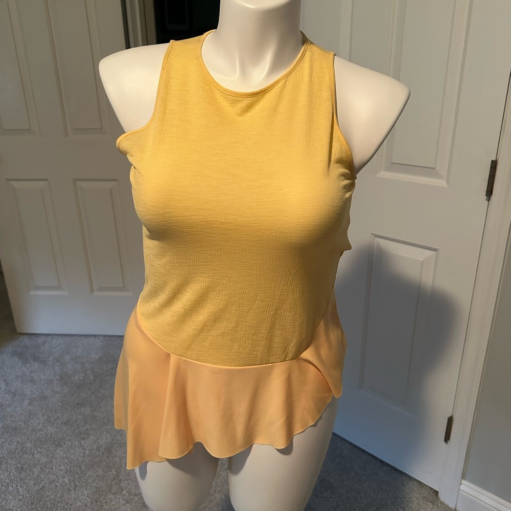 Women’s Yellow Sleeveless Peplum Top